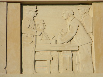 Beaumont Bank Building relief of banker, guard & bag of money