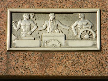 Beaumont Bank Building relief  of banker, lumberman & river pilot