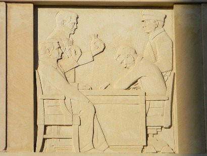 Beaumont Bank Building relief of banker, guard & bags of money