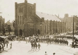 WWI Victory Parade passing the Trinity Galveston's Episcopal Church in 1918