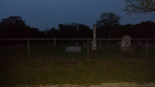 Whitney TX Hill County Oak Grove Cemetery at twilight