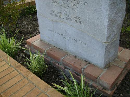 William Goyens TX Centennial Marker showing damage