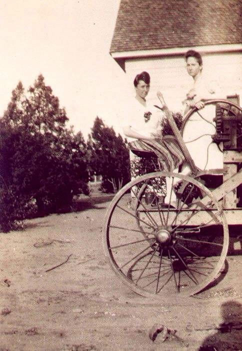 Coppell, TX - Jewel "Jack" Kirkland (L) and sibling on a tractor, c. 1920.