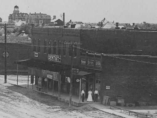 Milford Texas downtown sidewalk and pedestrians, 1900s