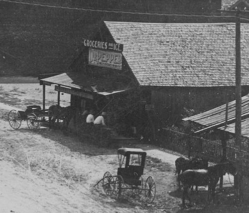 Milford Texas icehouse and Dr. Pepper sign