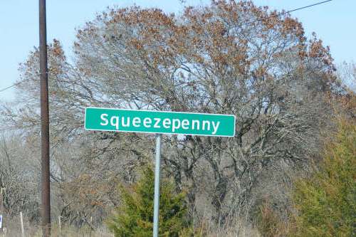 Squeezepenny city limit sign,  Squeezepenny  TX