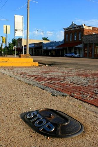 Calvert Texas traffic button "STOP"