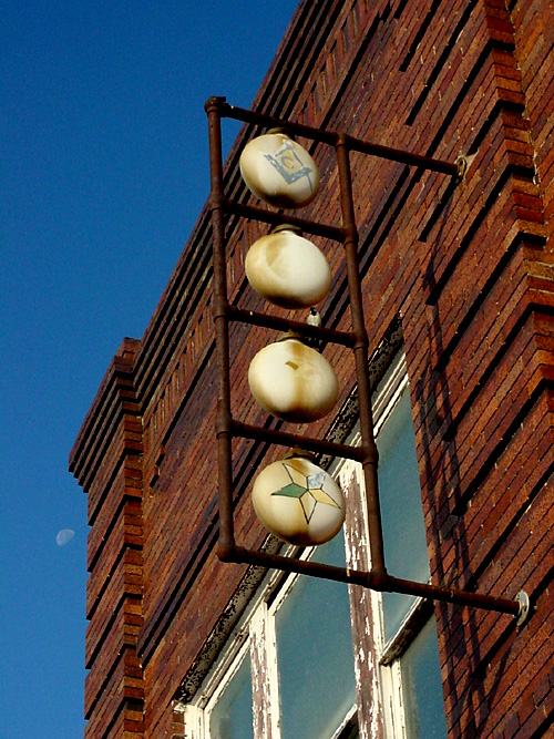 Masonic globes, downtown, Milam, Texas