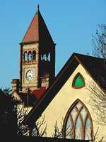 DeWitt County Courthouse tower and church