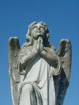Praying Angel statue in Warda Texas Cemetery