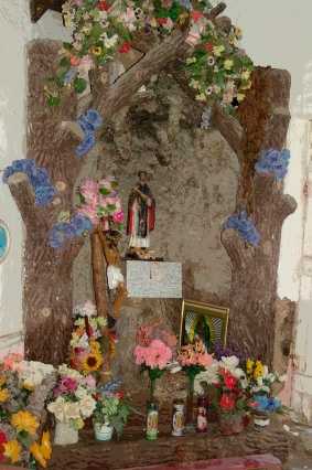 La Lomita Chapel flowers and statue, La Lomita Texas