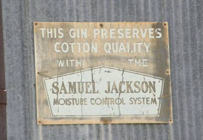 Earth Tx - "Samuel Jackson Moisture Control System " sign