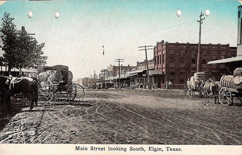 Cotton wagons on Main Street looking South, Elgin Texas
