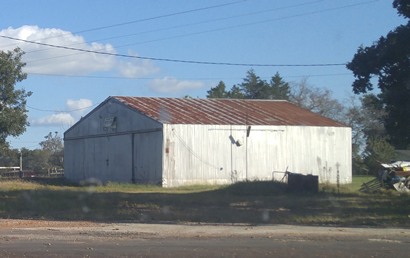 TX - Abandoned garage behind the gas station.