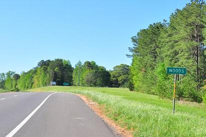 TX - Woods highway sign