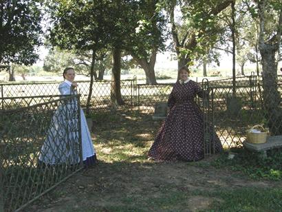 Docents at Liendo Plantation cemetery gate