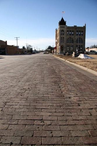 Brick street leading to 1890 Ness County Bank building, Ness City, Kansas 