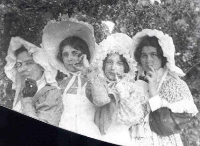 Four women smoking, Columubus, Texas 1898
