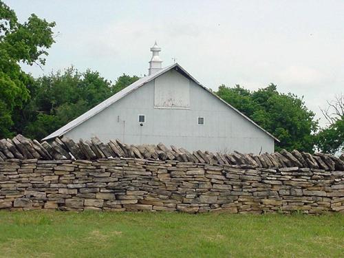 Kansas rock wall and barn