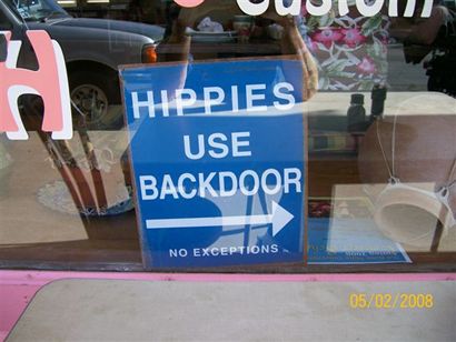 Hippies Use Backdoor Sign