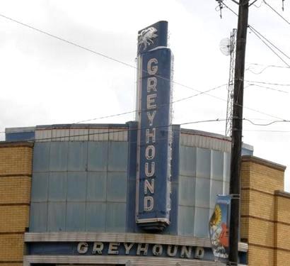Greyhound bus station neon sign