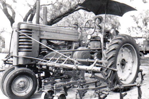 Dewee TX  - Hassler kid on tractor