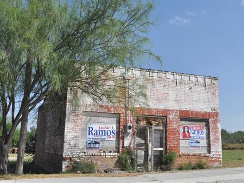 Mirando City TX - Ramos closed store with posters