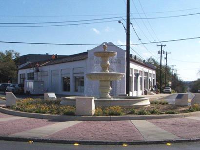 Olmos Park TX downtown fountain and old business building