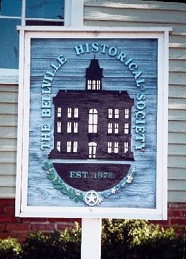 Sign with Austin County Courthouse, Bellville, Texas