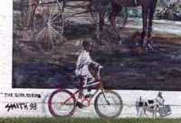 Boy bicycling and dog mural