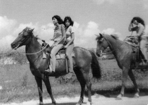 Girls on horse, Fourth of July Parade, Falfurrias, Texas