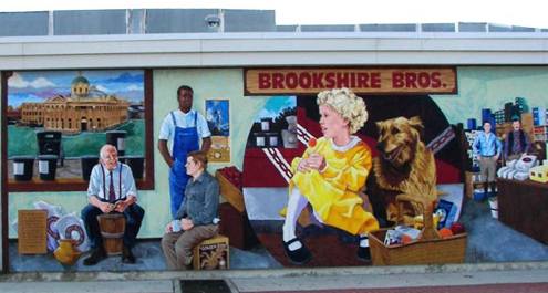 Lufkin Texas mural showing girl with dog, old man with courthouse 