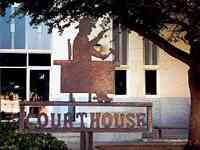 Judge and gravel Courthouse sign in Monahan