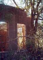 Roofless bank building in ghost town Sutherland Springs