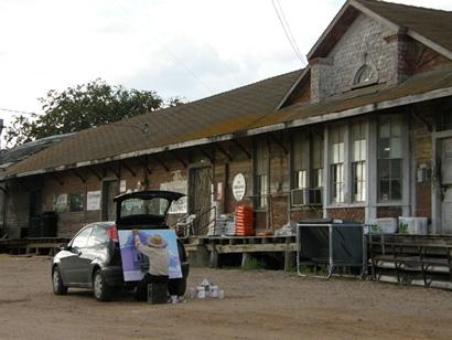 Jacinto Guevara painting Giddings' freight depot