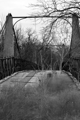 Walking over the Woodson Texas suspension bridge 