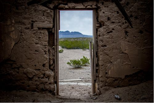 Adobe TX View of Adobe through ruins door