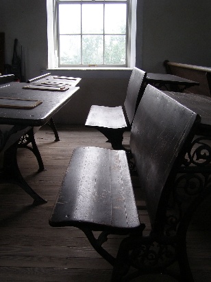 TX  - Old Helena Courthouse Schoolhouse courtroom classroom - school desks by window