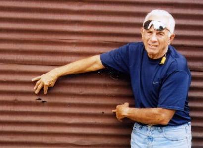 Jimmy Howell showing bullet holes in Shafter Texas shootout