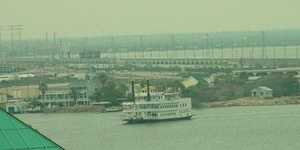 Galveston bay view of paddlewheel and refineries