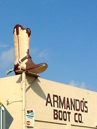 A boot on roof top, Raymondville, Texas