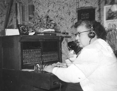 Elizabeth (Lizzie) Tucker at the switchboard, Andice, Texas