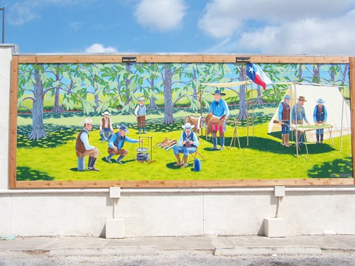 Bandera TX mural  'Rangers on the Medina' on Wash House on Main Street. 