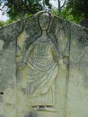 Ghostly angel on tombstone