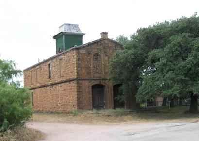 Koockville Texas store and community stone building