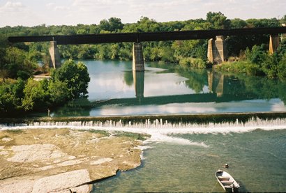 View of Guadalupe River and RR Bridge in  New Braunfels TX