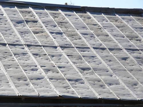 Placid Texas hail damaged steel roof