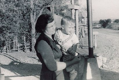 grandmother, Julia Albina David Ovesny and baby on Sandoval Store porch, Texas