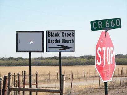 The sign to Black Creek Baptist Church, Zigzag Texas