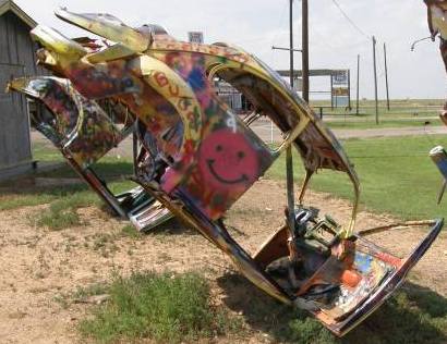 Painted cars in Bugg Ranch, Conway Texas